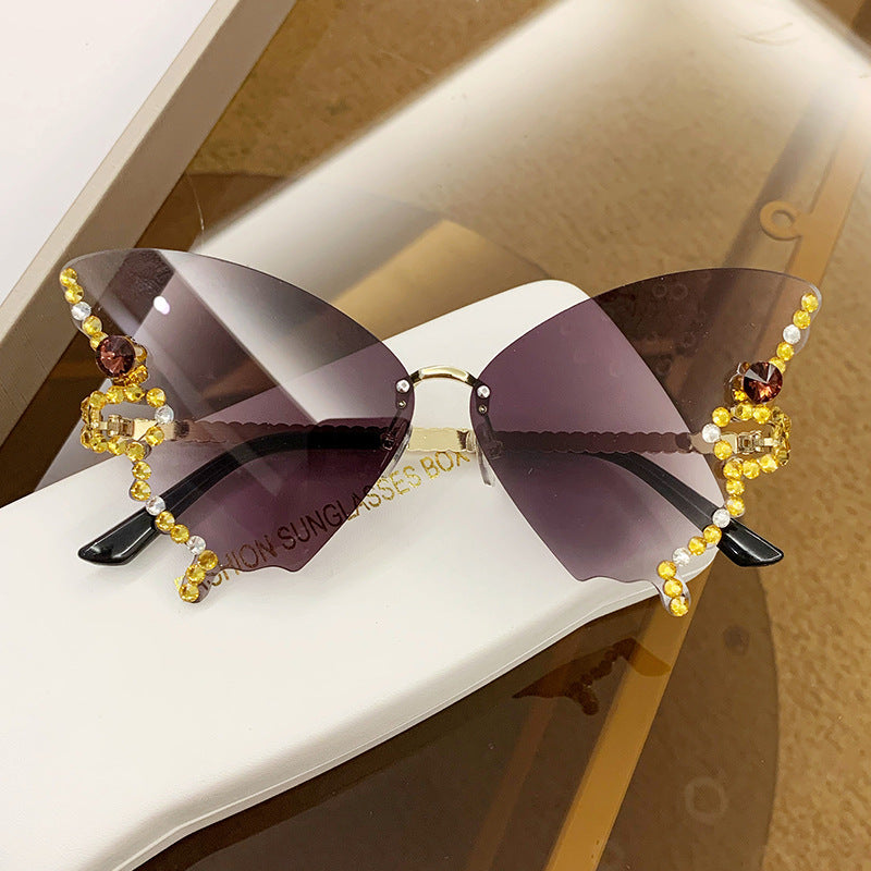 Gafas de sol de PC sin borde de diamante de forma de mariposa al por mayor